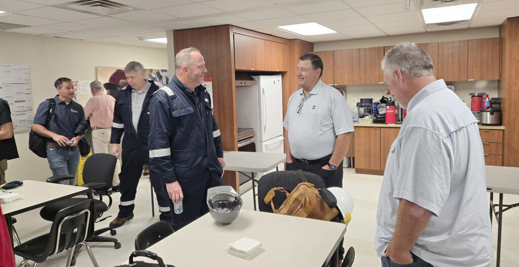 The Deep Borehole Demonstration Center team talking.