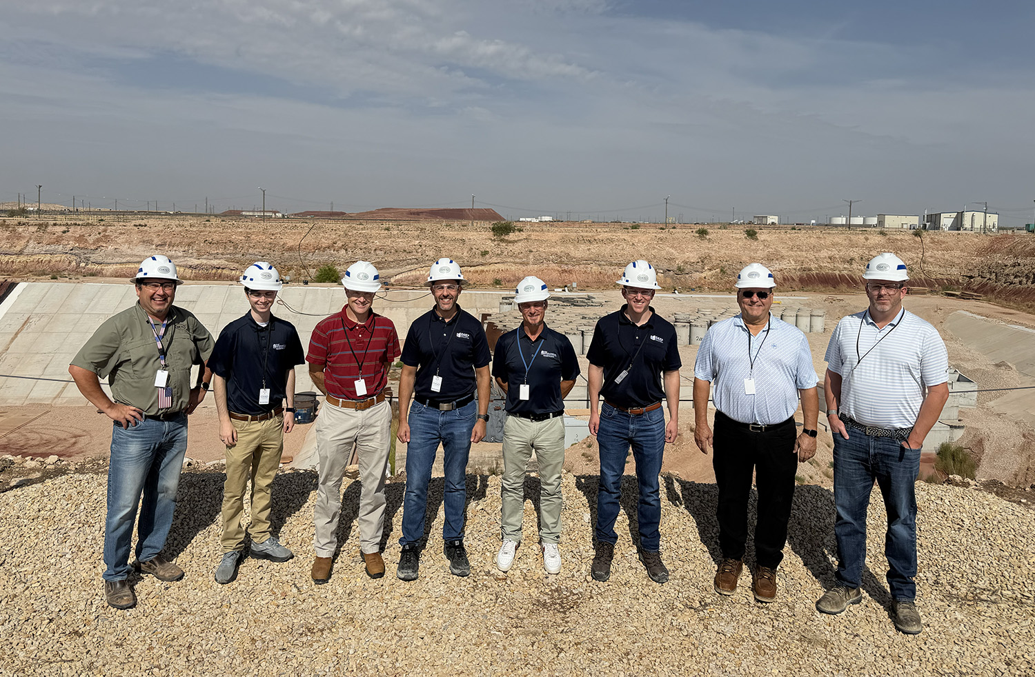 Deep Isolation’s Engineering team standing with Waste Control Specialists (WCS) in Andrews, Texas